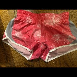 Nike pink, white, and grey shorts